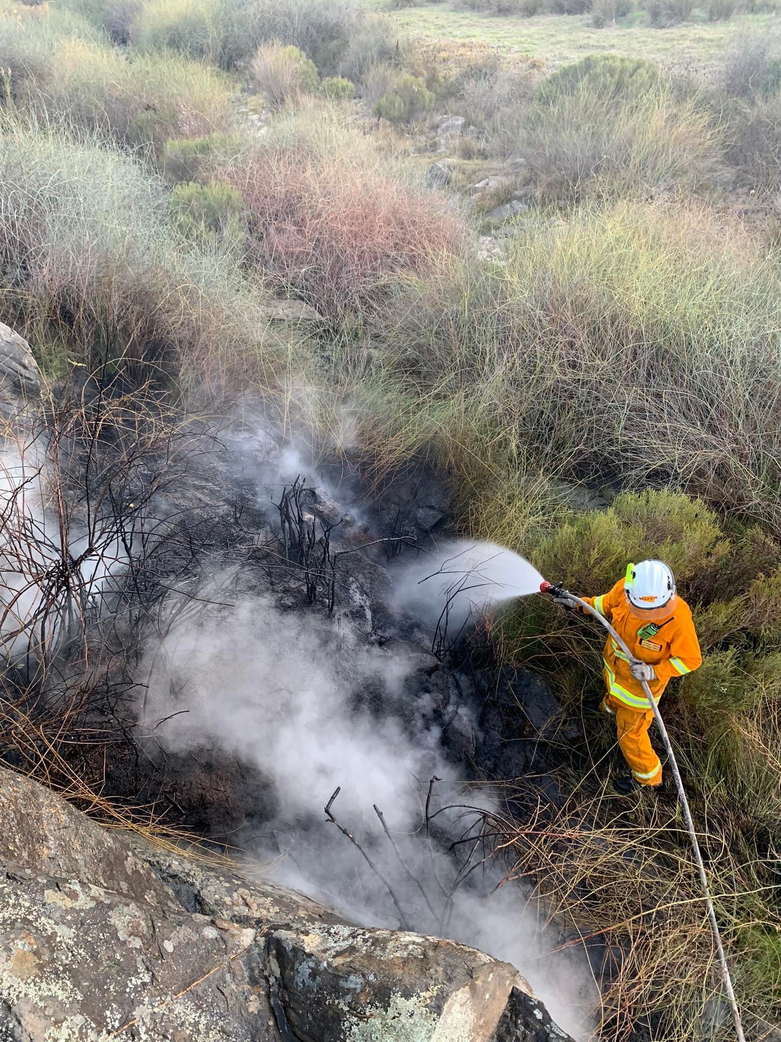 Grass fire near Hartley challenges local firefighters due to difficult terrain