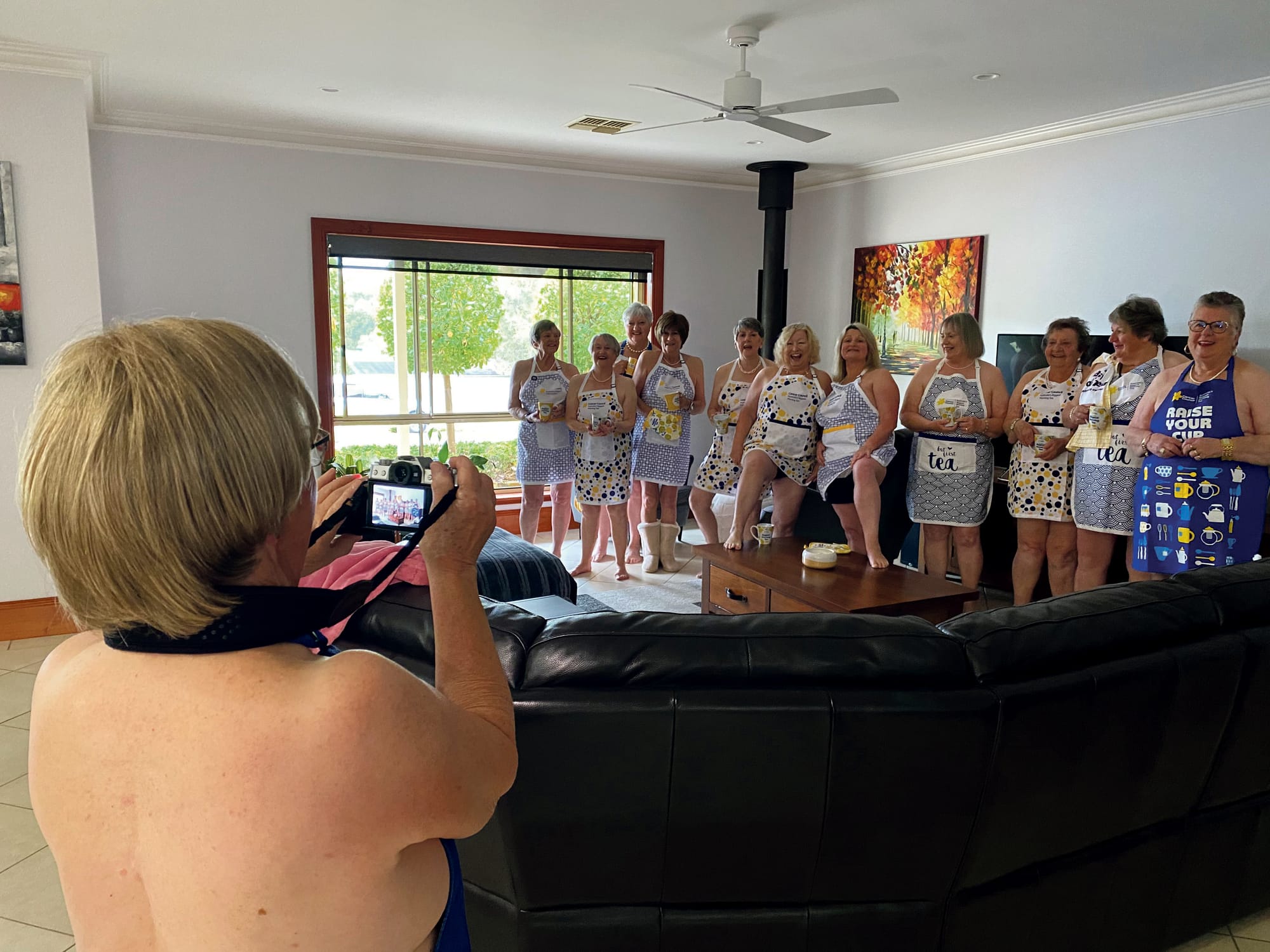 Suzanne Opitz photographing the group.