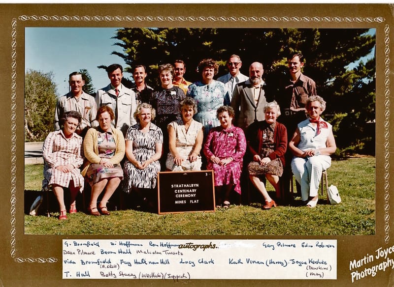 Hunt on for mystery woman in class photo post image